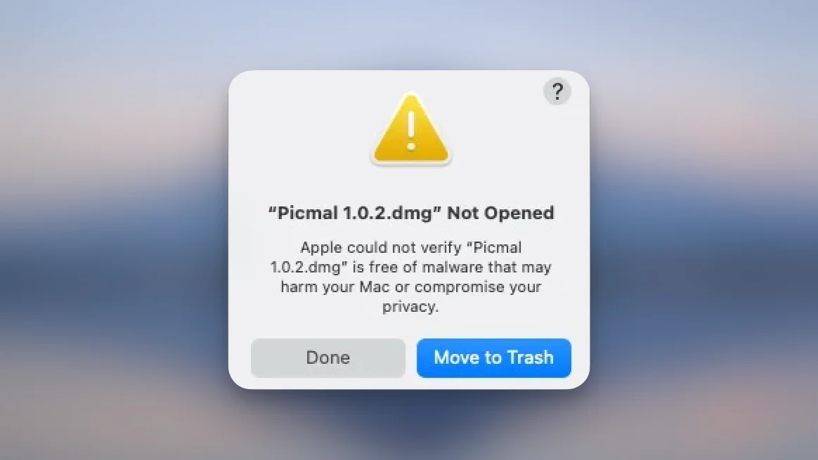 macOS security warning dialog showing malware detection for unsigned app